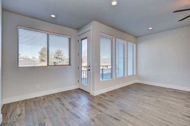 Building Photo - EASY CARE, HIGH EFFICIENCY TRI-LEVEL TOWNH...