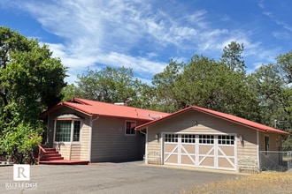 Building Photo - 6565 Whispering Pines Ln