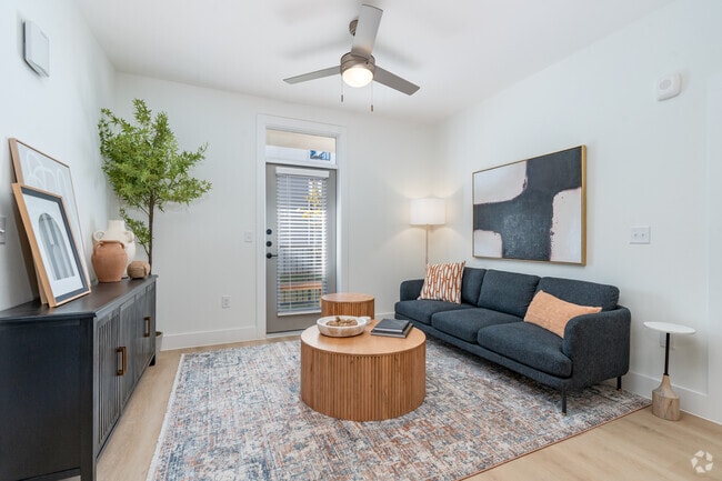 2BR, 2BA - 983SF - Living Room - Woods at Forest Crossing