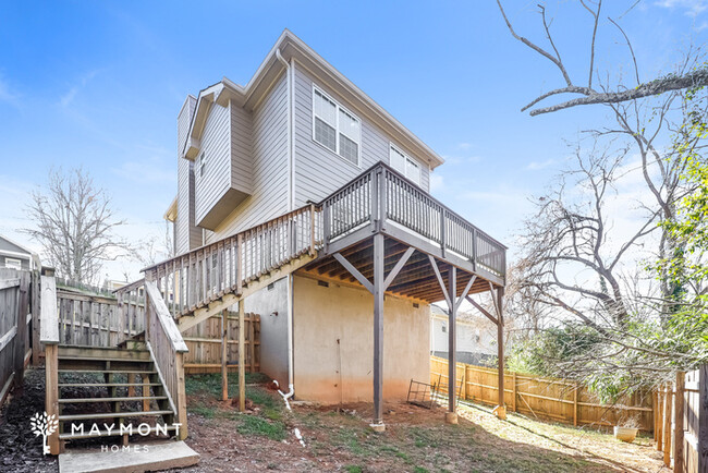 Building Photo - Home with Spacious Deck