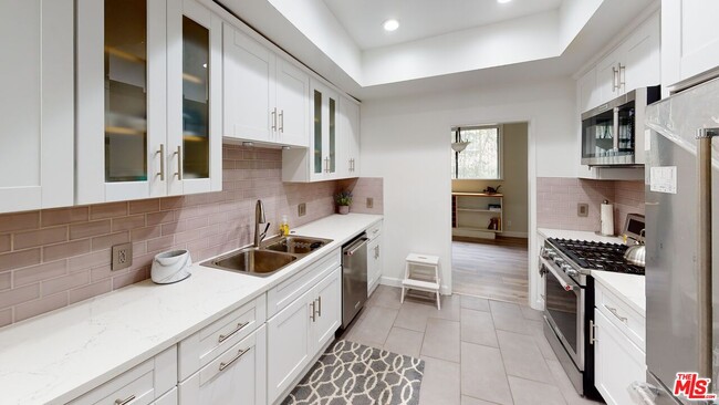 Building Photo - 3480 Barham Blvd