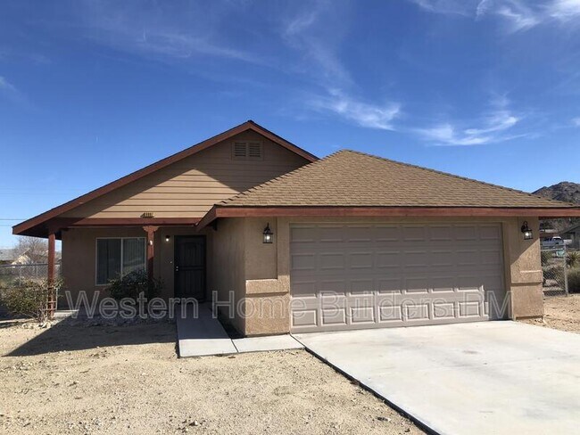 Building Photo - 6997-6949 49 Palms Ave