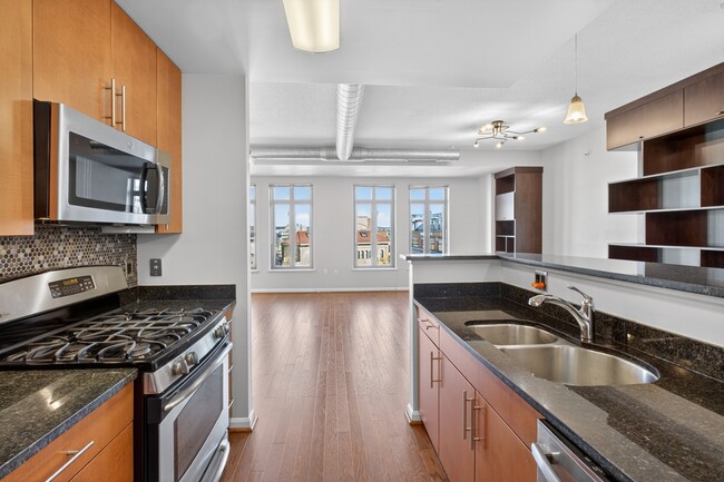 Building Photo - 1390 Kenyon St NW