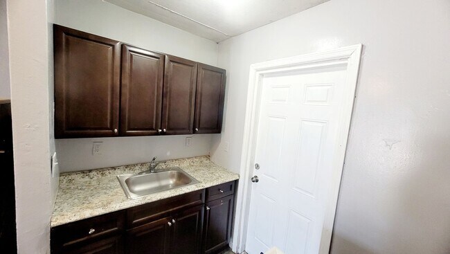 Building Photo - Charles Street Apartments 6