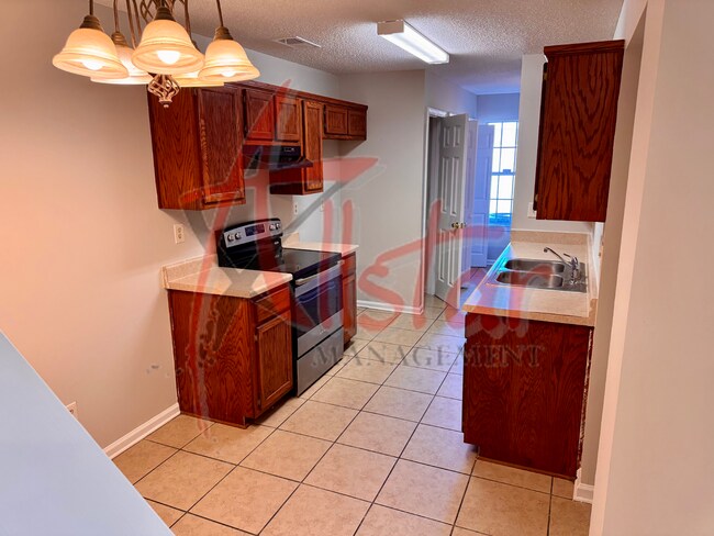 Foto del edificio - 7315 Madelyn Cove