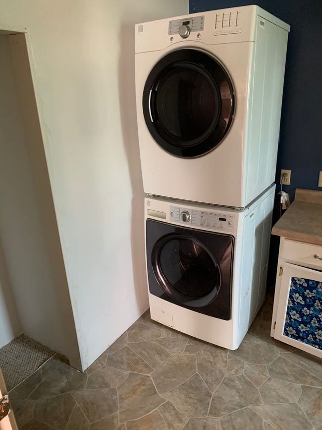 Bathroom from kitchen. Newer stacking washer and dryer. - 410 Church St.