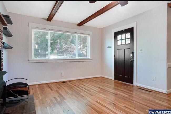 Building Photo - Available Now! 5 bedroom house with large yard and RV parking!