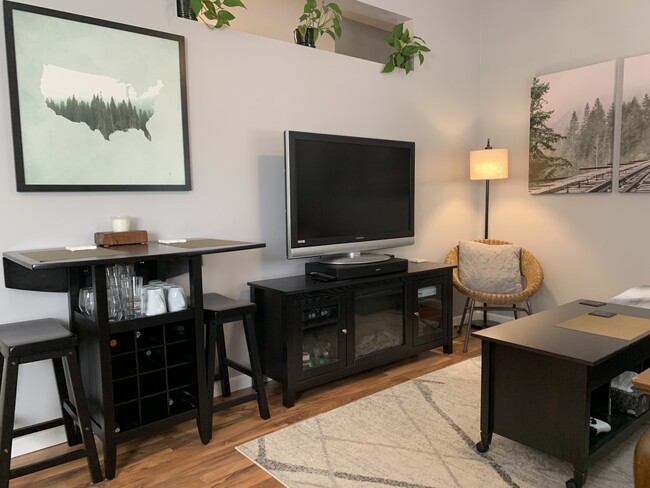 47" TV with Soundbar & Fireplace - 1433 E. Edgemont Avenue