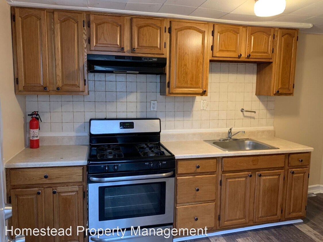 Foto principal - 3 br, 1 bath House - 214 Lexington Ave