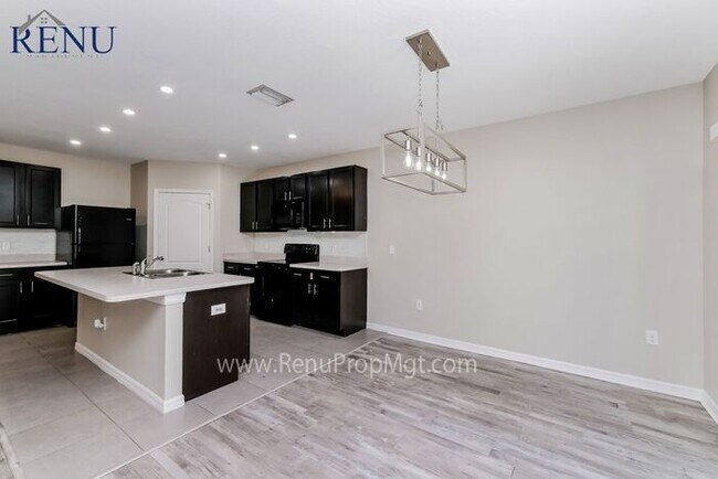 Building Photo - This Summer Special is Heating Up!: 50% of...