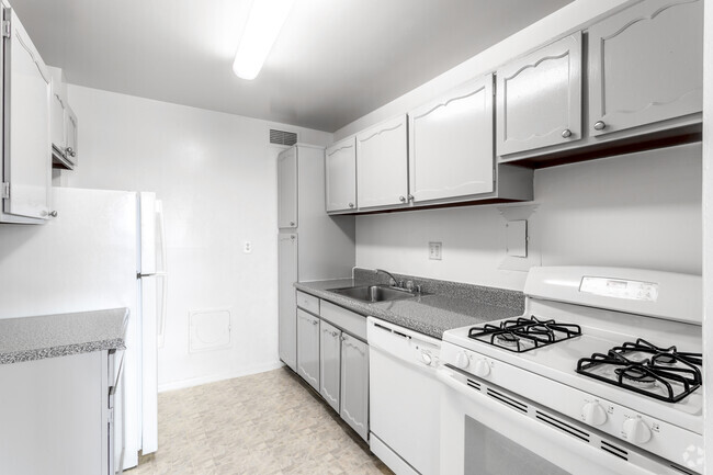 2 BR, 1.5 BA - 1,015 SF - Iverson Towers & Anton House Apartments