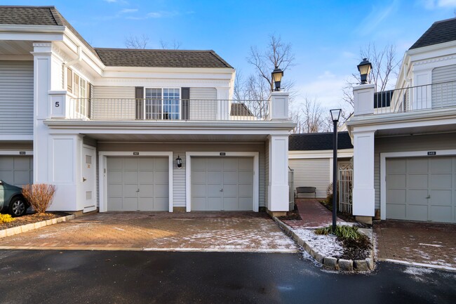 Private garage with entry into unit - 145 Riveredge Dr