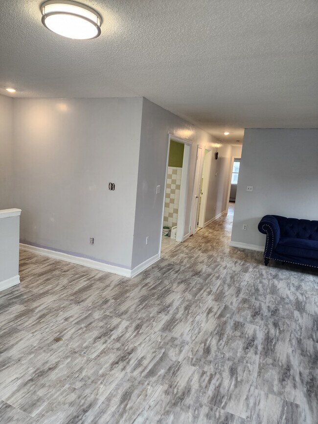 Top of stairs living /dinimg room - 691 Shepherd Ave