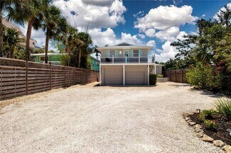 Building Photo - 9033 Midnight Pass Rd