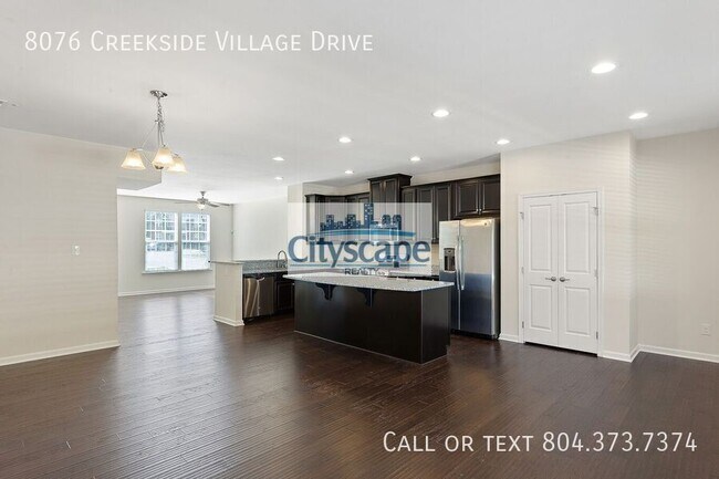 Foto del edificio - 8076 Creekside Village Dr