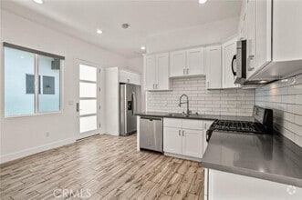 Building Photo - 7304 Woodley Ave