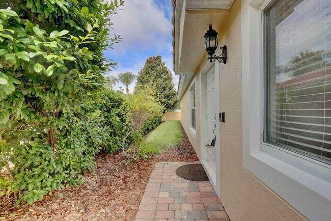 Photo - Spacious 3-Bedroom 2 Bath Villa with 2-Car Garage Steps from the Resident Gate in the Prestigious... House