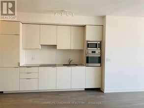 Building Photo - 11 Wellesley St W