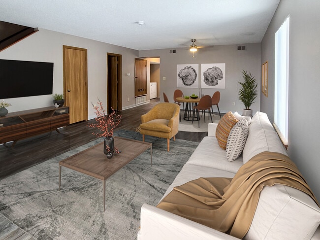 Renovated Three-Bedroom Apartment Living and Dining Area at Prairie West in Ames, IA - Prairie West