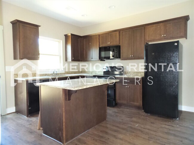 Foto del edificio - 6451 Cheshire Cove Dr