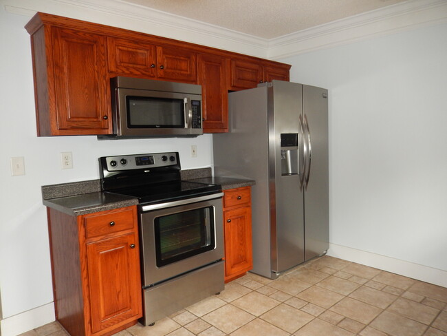 Kitchen with Stainless Steel Appliances - 2065 Pinemount Blvd