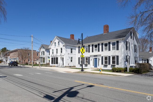 Some homes have converted to businesses on Main Street of Yarmouth.