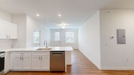 This 1000-square-foot single-story residence in Indianapolis offers a thoughtful layout with 4 bedrooms and 2 bathrooms. The home showcases a blend of practical design and contemporary aesthetics. The primary bedroom, measuring 160 square feet, provides a generous retreat. Throughout the house, neutral-toned walls create a bright, airy atmosphere, complemented by warm wood-look flooring in common areas and plush carpeting in bedrooms.

The modern kitchen is a highlight, featuring crisp white cabinetry, stainless steel appliances, and ample counter space. Bathrooms are efficiently designed with clean lines and essential fixtures. Large windows in the bedrooms allow natural light to flood the spaces, while offering views of the surroundings.

Storage solutions are integrated seamlessly, with a dedicated closet and built-in wire shelving in some rooms. The property's design emphasizes functionality and comfort, making efficient use of its 1000-square-foot floor plan. Located at 6214 Long Channel Ln, this home presents a well-maintained and inviting living space in a desirable Indianapolis neighborhood.