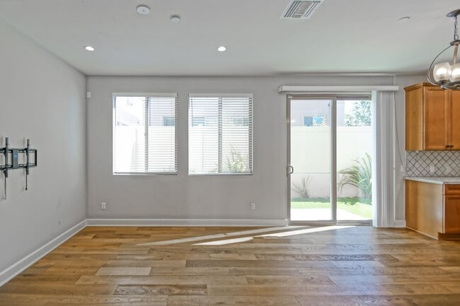 Building Photo - BUILT IN 2019: SPACIOUS & BRIGHT, DETACHED TOWNHOUSE W/ 2-CAR GARAGE & FENCED YARD IN GREAT RESID...