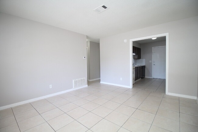 Building Photo - Now Available –Updated 2BR Duplex with All Tile Flooring, Eat-In Kitchen & Prime Location Near UW...