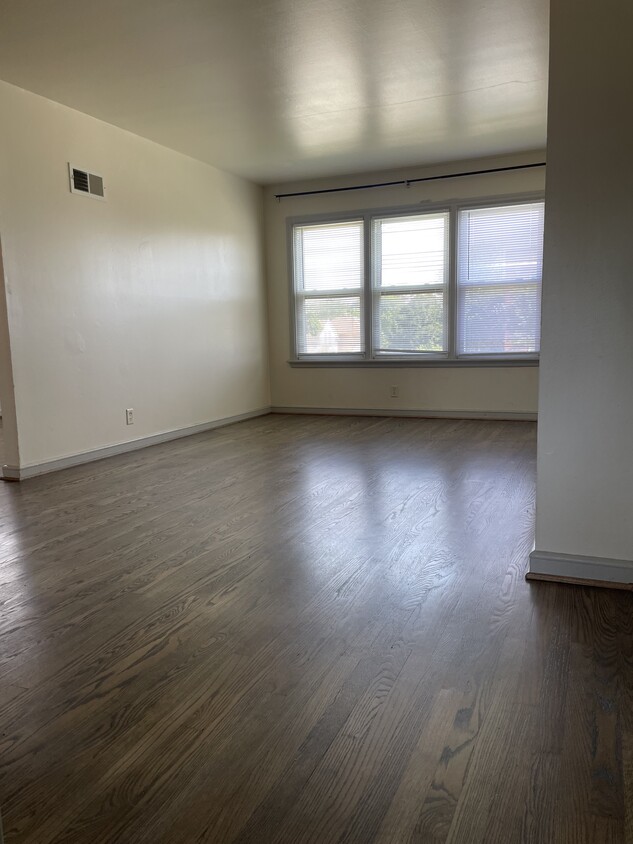 Large Living Room Natural Wood Flooring - 5615 W Wisconsin Ave