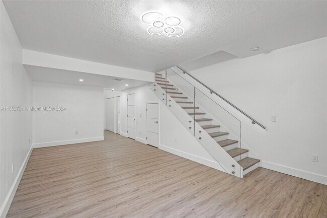 Building Photo - 9837 W Okeechobee Rd