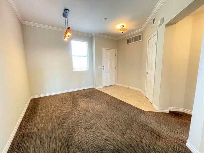 Building Photo - Dual-Master Upgraded Condo in desirable Ca...
