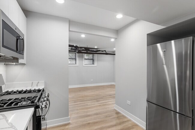 Foto del edificio - 6931 N Lakewood Ave