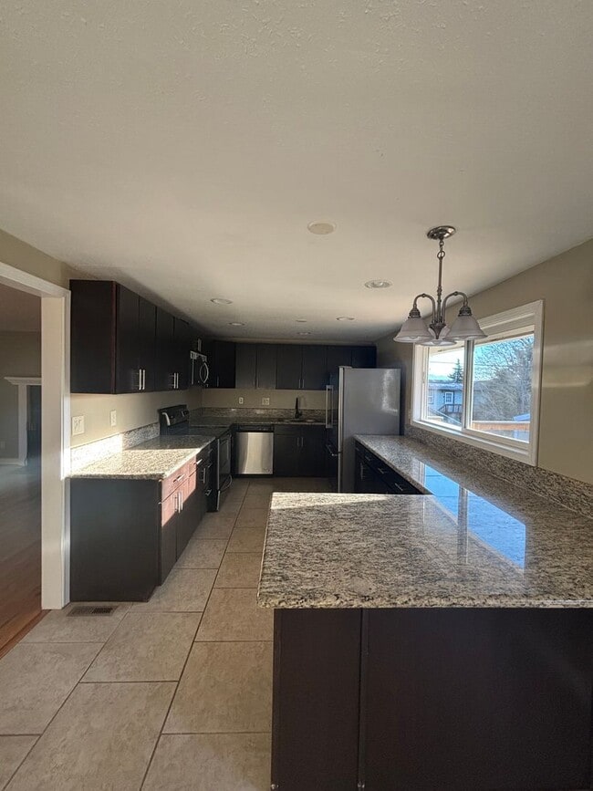 Building Photo - Stunning 4BR Family Home with Brand New Deck