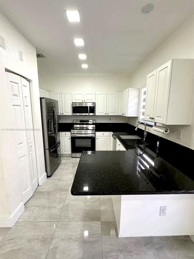 Building Photo - 9285 SW 220th Ter