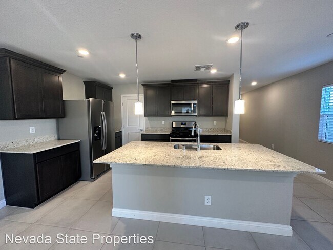 Building Photo - 4 br, 3 bath House - 6972 Caldera St