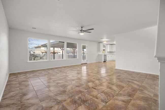 Building Photo - Spacious 6-Bedroom Home with Game Room, Covered Patio & Upgraded Baths