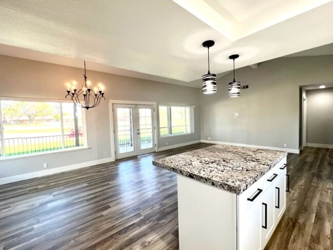 Building Photo - Beautifully Remodeled 3 Bedroom Pool Home ...
