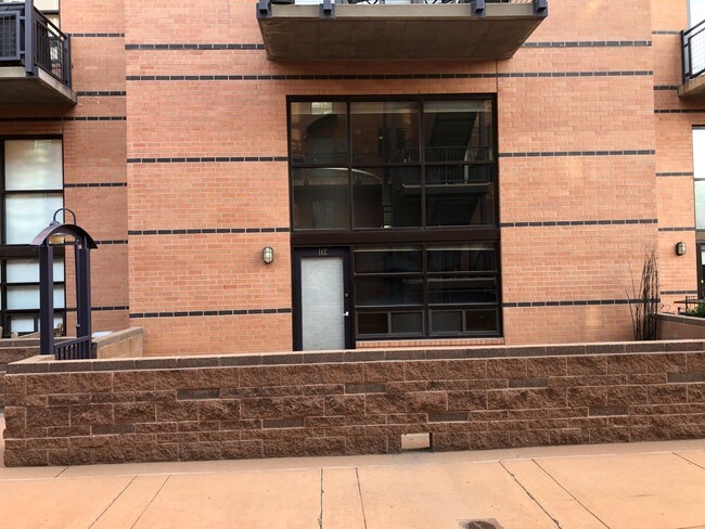 Front of Unit w/large wall of windows. - 930 Acoma St
