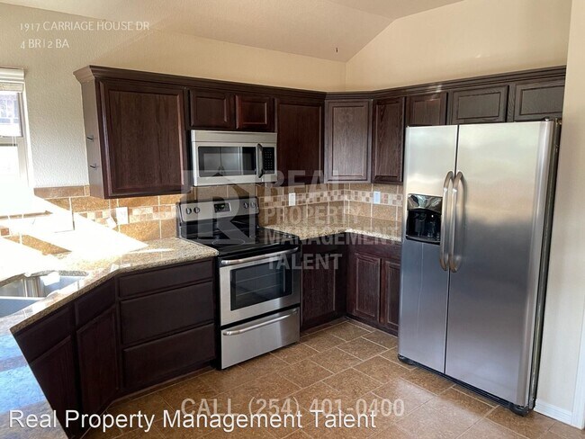 Building Photo - 4 br, 2 bath House - 1917 Carriage House Dr