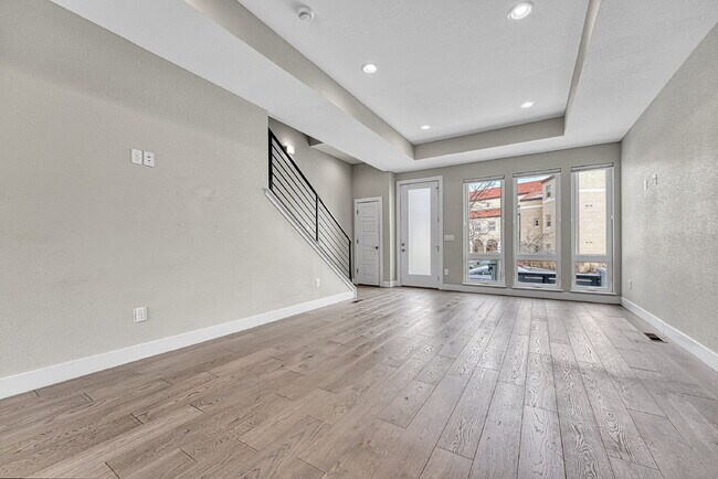 Building Photo - $3,145.95- 3 Bed, 3.5 Bath Townhome in Denver with Central AC and In Unit Laundry