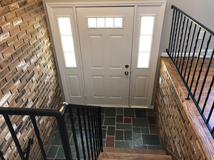 Building Photo - Exposed Brick Interior of the Home!