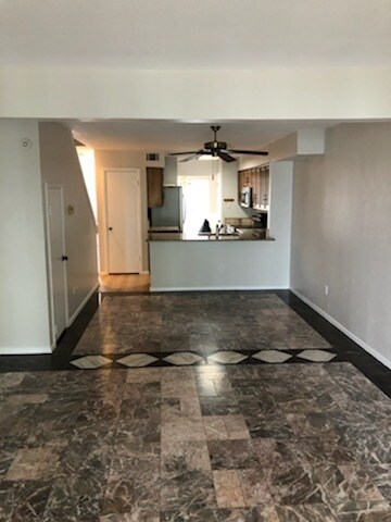 living room looking into kitchen - 3824 Mediterranean St