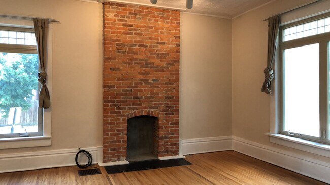 Very large living room thru french doors. - 1321 Highland St