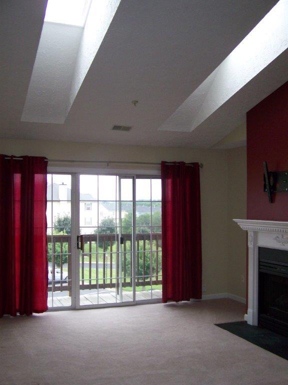 vaulted ceiling with sky lights - 151 Brookland Ter