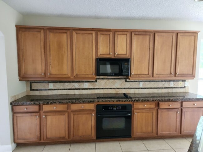 Building Photo - 12464 Dewhurst Cir