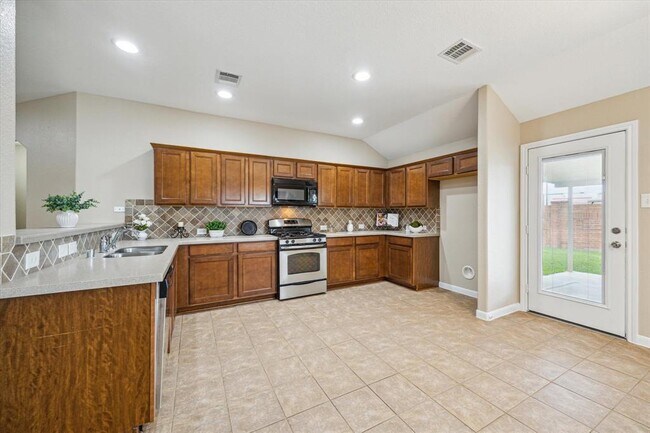 Foto del edificio - 9015 Springcroft Ct