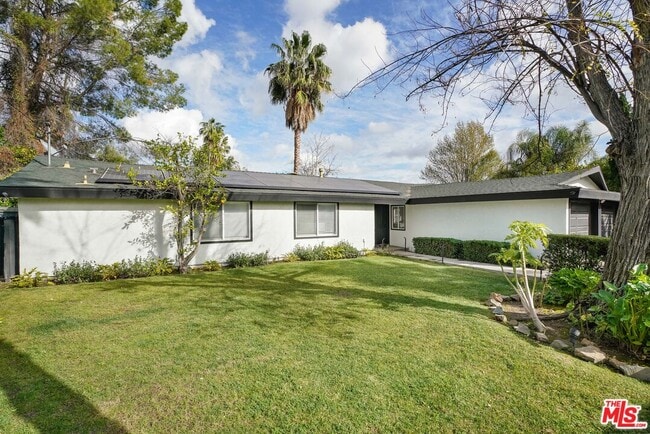 Building Photo - 5812 Comanche Ave