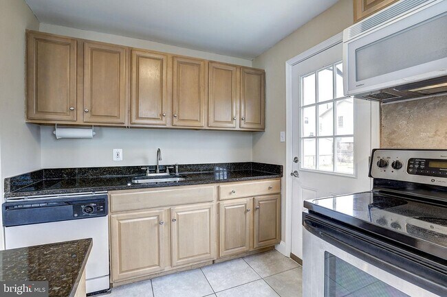 Lots of cabinet space! - 700 Burgundy Dr