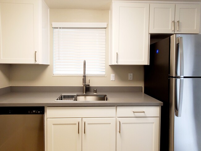 New Stainless steel dishwasher and Fridge - The Edge on the Boulevard